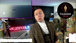 Кирилл Фёдоров, российский Z-блогер, на фоне флагов России и Армении